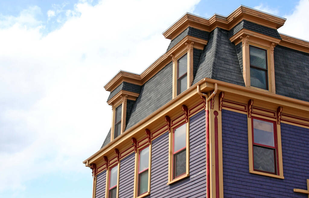A french inspired mansard roof on a residential home