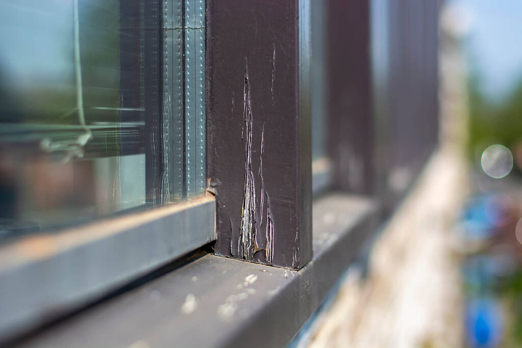 Visible damage on a residential wood window