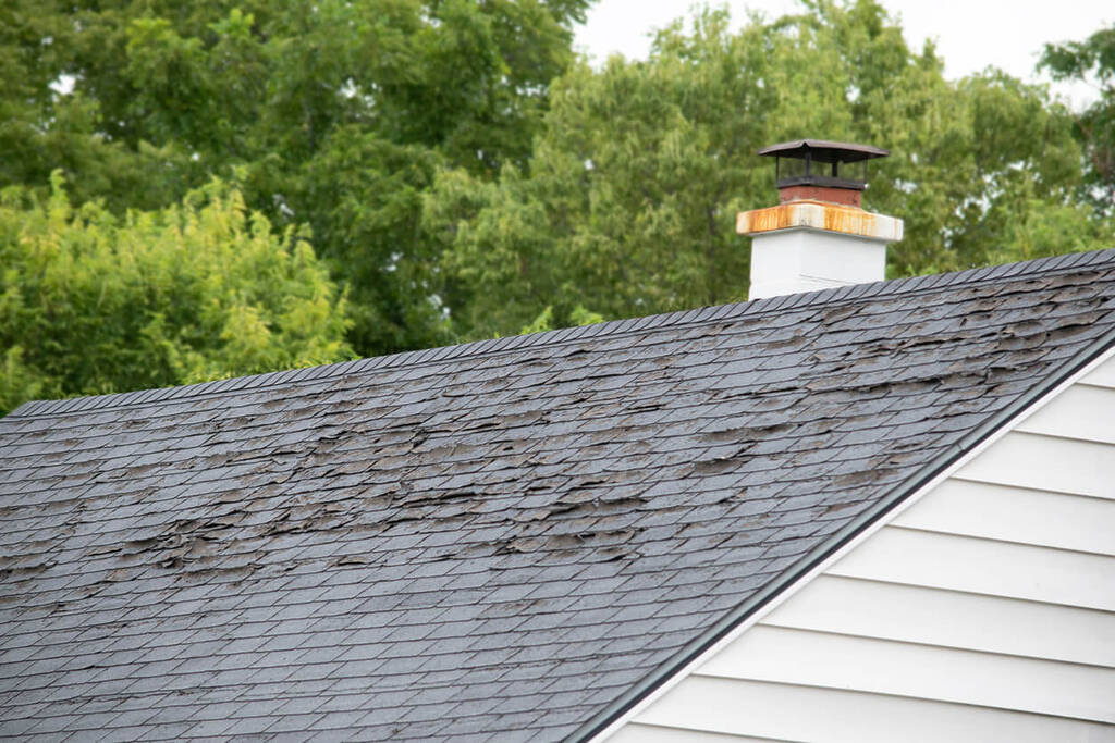 old damaged roof needing repair